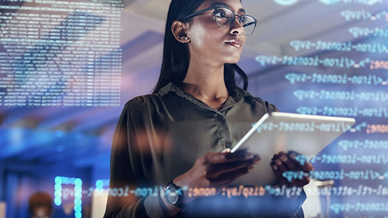 Engineer reviewing usage data on a tablet