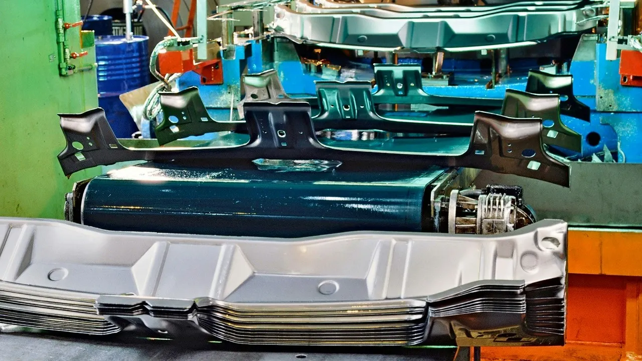 Stamped sheet metal parts in an automotive press line